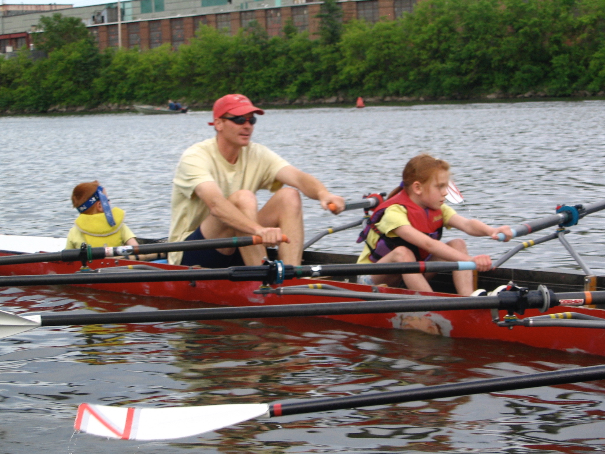 Matt rowing with young Emma and Ben